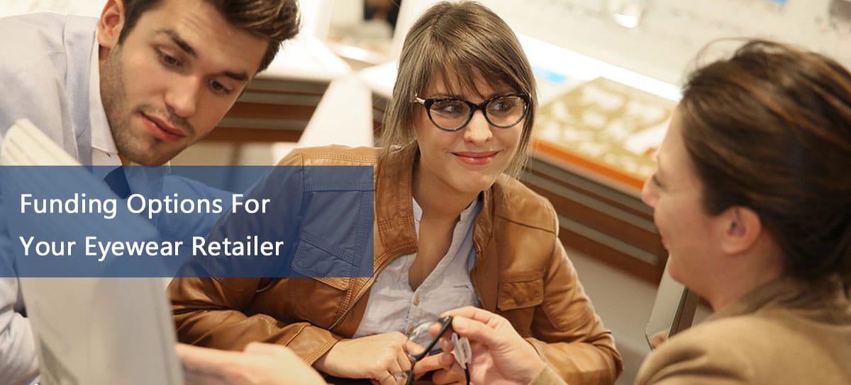 Employee showing glasses thanks to eyewear retailer financing
