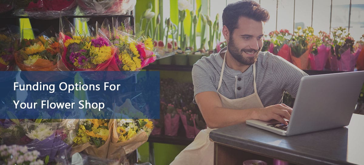 Florist working in new shop thanks to flower shop financing