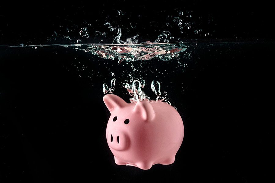 Decline in Bank Lending - Image of piggy bank submersed underwater